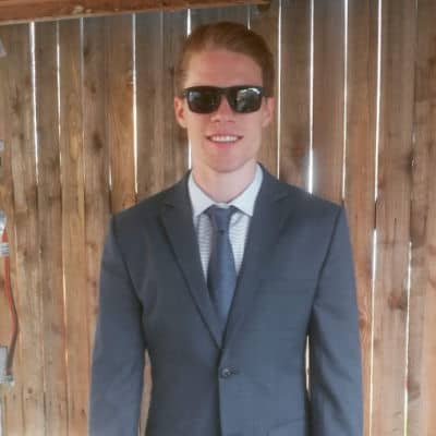 Riley Armstrong in suit