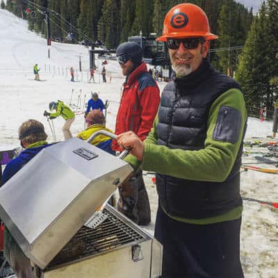 Robby Schwarz grilling wearing EnergyLogic hard hat