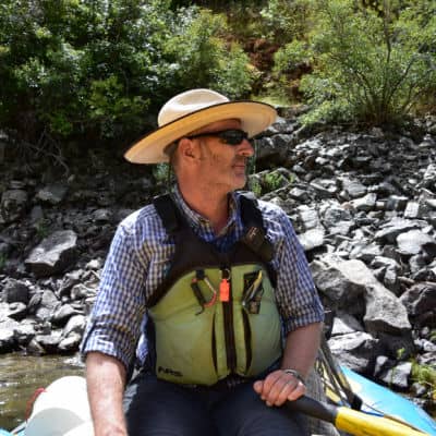 Robby Schwarz rafting on the river